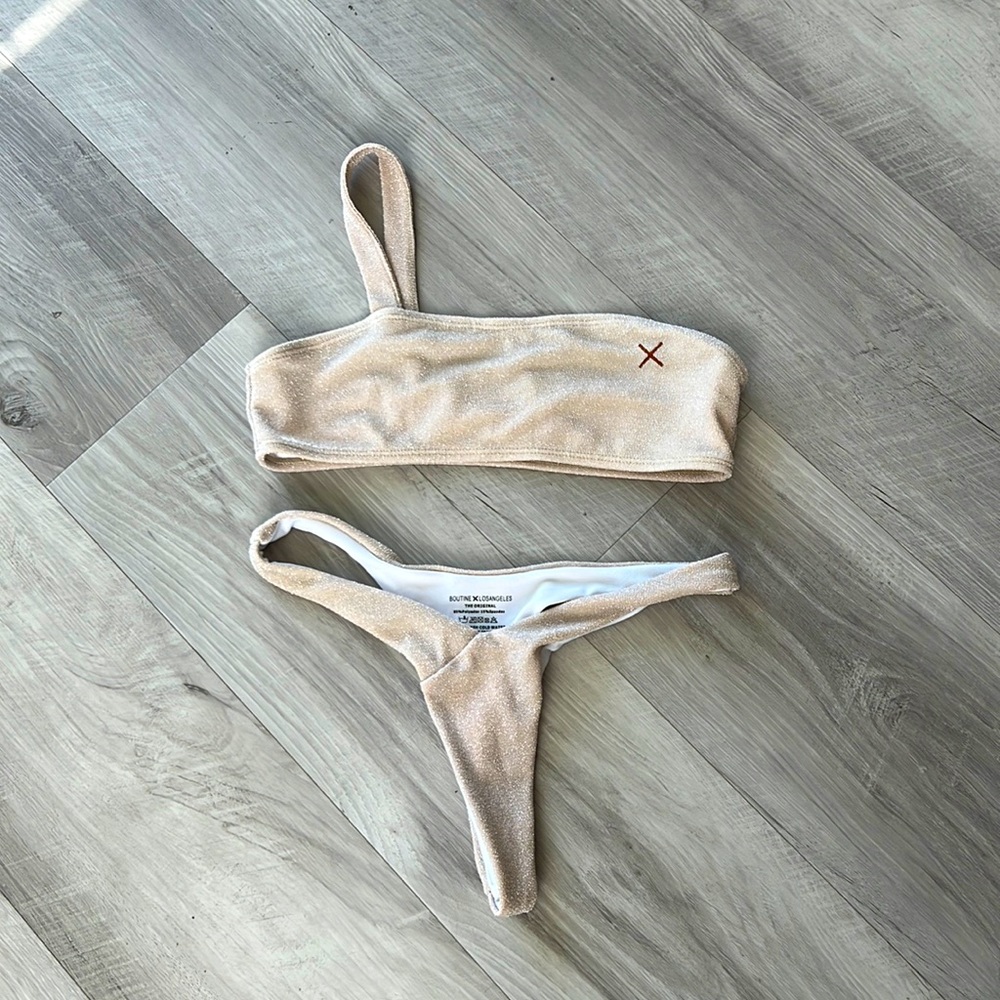NEVER WORN CUTE GLITTERY BATHING SUIT. SIZE SMALL.